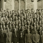 Large group of frosh, predominantly men, standing infront of War Memorial Hall at the University of Guelph.