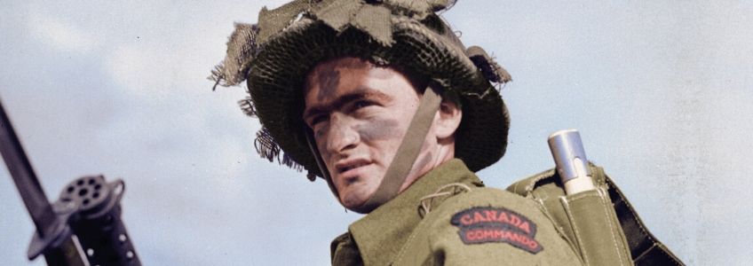 Detail of Fighting History book cover. Image of young soldier holding a gunand wearing a green hat.
