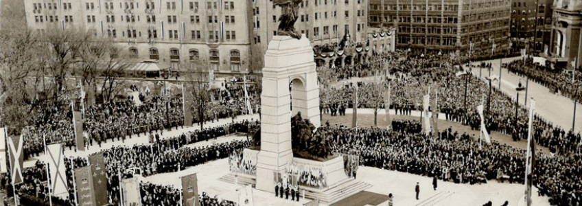 picture of people gathered outside a second world war monument