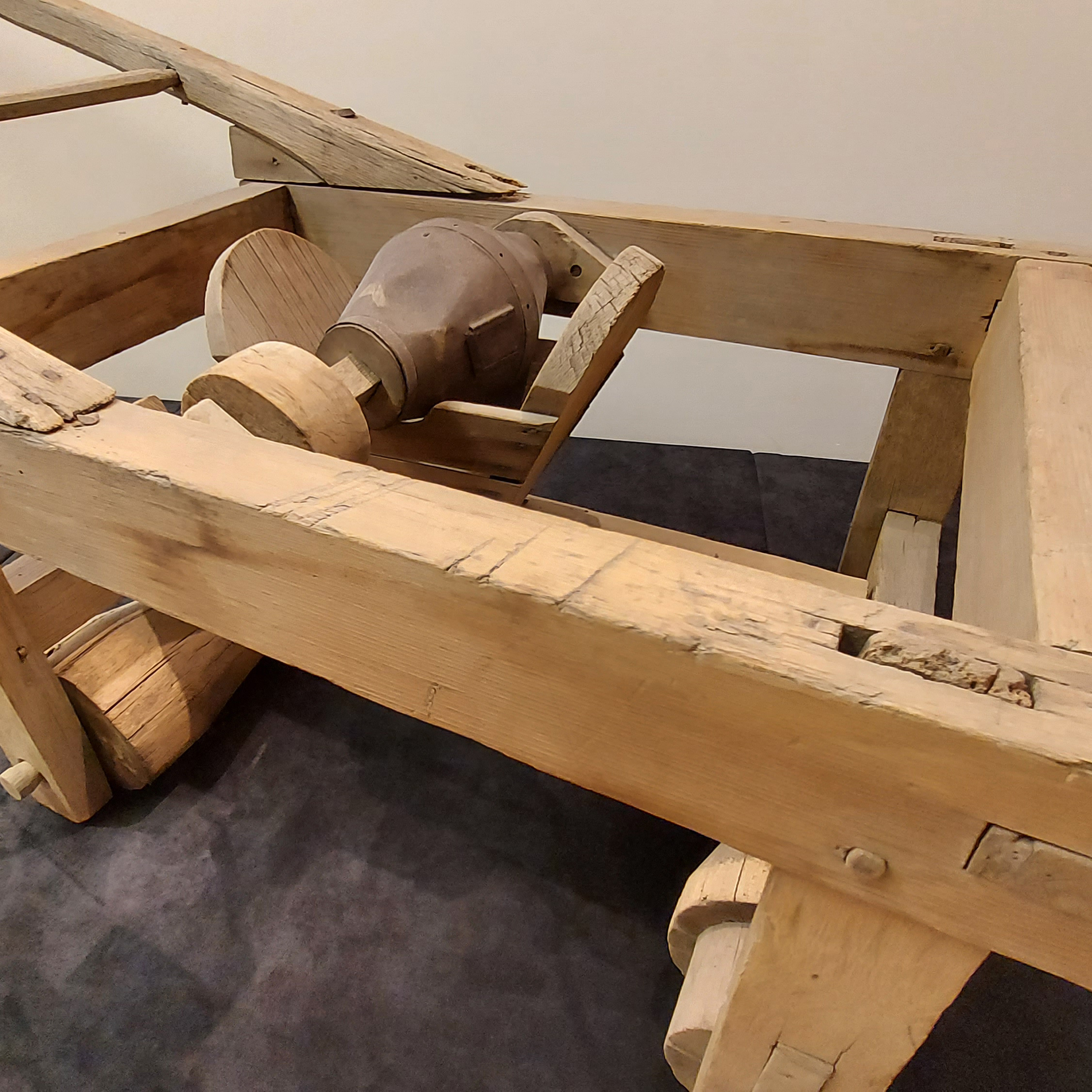 wooden turnip seeder tool, with wheels.